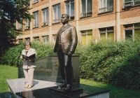 Next to the Tomas Bata statue in front of the factory