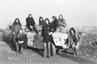 The Plastic People of the Universe band with Ivo's car (so-called Combat Tudor - Škoda 1101 VO), Prague, 1978