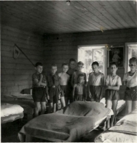Pavel Pick fourth from left (high back) at a scout camp; left Petr Poláček, Pavel's good friend, next to him Jan Němec, later film director, in the right Škoda, the future president of Melantrich, 1946
