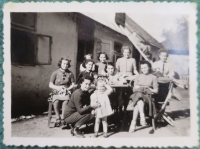 Ivan's mother Maria Feder before the war (squatting next to the child)