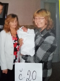 Renata with her granddaughter Dominika in her arms, in the Trenčín maternity hospital, 2008.

