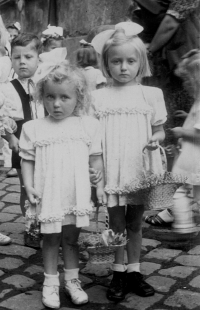Marie Svatošová with her sister at the Feast of Corpus Christi, Marie on the right, about 1946