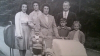 Anna's sister Květa, with her family and a pram
