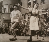 A newspaper clipping. From her trip in Eastern Germany. Eliška is dancing. 