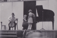 Vojtěch Petr at a concert while playing the cello