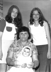 HIs mother Anastasia, his sisters Stavrula and Kateřina, the child on the lap is a daughter from Stavrula, 1970s 
