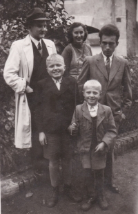 From the left in a white coat cousin vicar Jiří Vojtěchovský, servant Marie, older brother Jindřich, Jaroslav and cousin Jiří Sixta, later a translator and editor for Mladá fronta, 1945