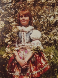 Alice, second-born daughter of the witness in a traditional costume, Suchá Loz, 1972