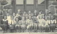 Bystrá Elementary School (Hauptschule), 3rd grade, female witness in the front row, first from the left, 1943