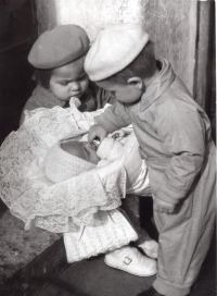 Welcoming little sister Evička after coming from the maternity ward, Brno 1960