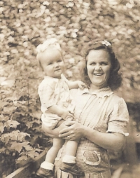 With his mother, late 1940s 
