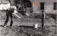 His wife Ludmila and daughter Liduška recultivating the garden behind the pharmacy, 1975