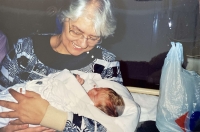 With his first grandson in 1995