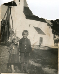 Mária Bors with her brother József in front of Church in Hamuliakovo, about 1936.