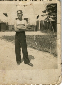 Brother Jószef infront Pammer famiy house in Hamuliakovo, 1947