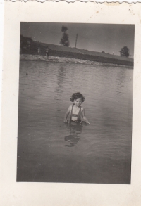 In childhood while swimming in the river Moravia, 1941