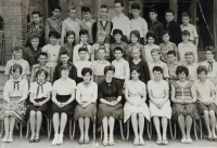 The witness’s school photo: fourth from left in the first row, primary school