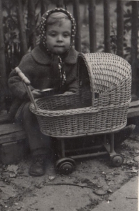 Alena Vondášková at her grandmother's in Janov, 1960