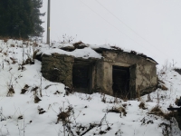 cellars in the hillside where people hid during the fire