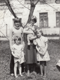 Daughters and a niece in front of the house in Vrchlabí