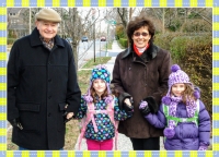 Dana and Juraj with grandchildren in kindergarten
