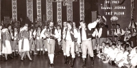 Folk Ensemble of Songs and Dances JISKRA Plzeň, piper J. Konrády in the foreground, 1980s
