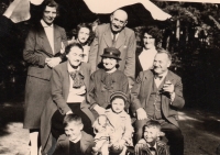 A trip at Heulos in Jihlava in 1935 (Back row from left to right: Marie Pojerová - the housekeeper at the Papež family, the daughter of a Jewish family who lived in the house at the Papež family, the father of this family and the mother. In front of them: Marie Šašecí, née Papežová - Eva's mother, Marie Papežová and Karel Papež - Eva's grandparents. Below: Eva Šašecí and in front of her a son from a Jewish family and his friend)