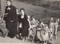 Confirmation in Prague 5 - Smíchov (in front - not pictured - the parish priest leads the boys, behind him the vicar Eva Šašecí leads the girls). Probably in 1956 