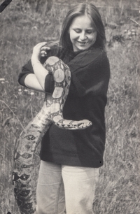 Michaela Othmani in 1987 with a king boa constrictor