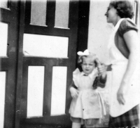 Jana Šilerová with her mother / in front of the house of Mrs. Jeřábková / Znojmo / 1954