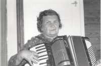 The grandmother of a witness with an accordion, circa 1948
