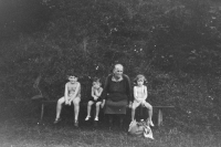The Bauer siblings with grandmother Pavla in the 1950s