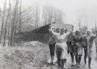 Zdenka in rain coat at forest voluntary help, 1970