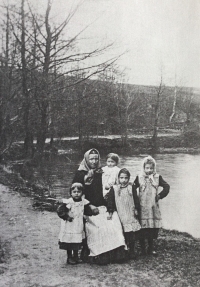 Her grandmother Anna Veselá and Josef's mother standing on the left at Jetmarský pond, 1910