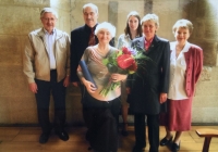 Zdenka (in the middle) with flowers on the occasion of her second graduation, Prague 2012