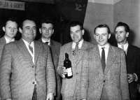 Miroslav David (holding the bottle) with the collective of the United Agricultural Cooperative in Děrné / 1960s
