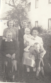 On the right Zdeněk Nevšímal with his mother Kristýna Nevšímalová and his little brother Oto, behind them his mother's friend Marie Sluková, 1953
