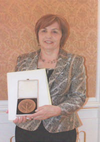 With an award from the Ministry of Education, Youth and Sports on Teachers' Day, Prague 2014