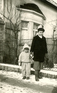 With her brother Karel in front of the family house Obora, 1941/42