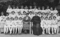 First Communion, 1936 Bílina, the memorial is in the middle of the second row