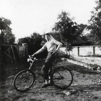 With a new bike, 1957