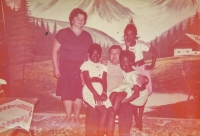 Children at the Fim Motel with its employees