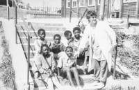 Children by the Fim Motel with one of the matrons