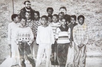 Children with a teacher and deputy headmaster Igor Novohradský (left)