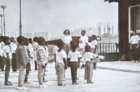Children during roll call at the Fim Motel plaza
