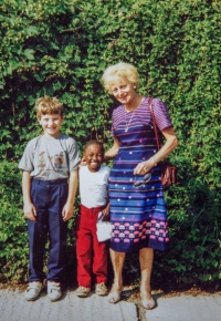 Teacher Maria with a boy they called Little John. She was hiding him at the time of departure, intending to adopt him
