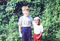 Little John with teacher Maria’s son; she wanted to adopt John