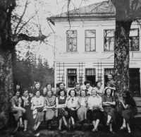 Hana's gymnasium class (Hana is in the first row in the middle in a white blouse with a tie)