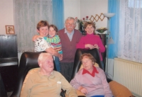 The grandparents with their children and grandchildren 