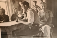 Her father from work deployment in Germany before the war, back center, 1938